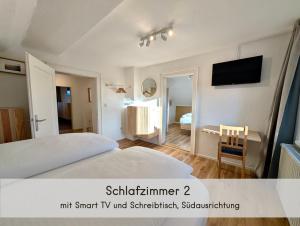 Das Waldhäuschen - bis 10 Personen, 4 Schlafzimmer, 2 Bäder, Tischkicker, kostenlose Parkplätze, WLAN, Smart-TVs