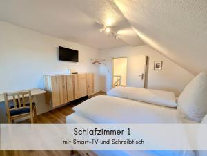 Das Waldhäuschen - bis 10 Personen, 4 Schlafzimmer, 2 Bäder, Tischkicker, kostenlose Parkplätze, WLAN, Smart-TVs