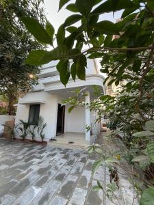 Grha -A Quiet 3BHK Home Among the Locals, with a Plunge Pool