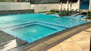 Elegant Central 1BR BGC 11P Uptown Parksuites T2