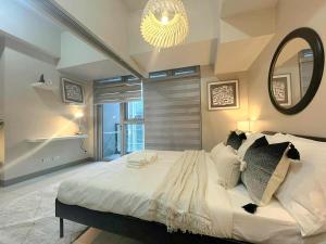 Elegant Central 1BR BGC 11P Uptown Parksuites T2
