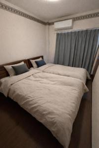 道頓堀 なんば迄地下鉄4分 鶴橋 一軒家丸々貸切 最大12名宿泊可能