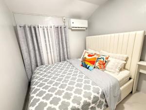 Exclusive 2-bedroom Townhouse with Fast Wi-Fi Netflix Disney Plus Prime Video near Toril Bago Gallera Ulas