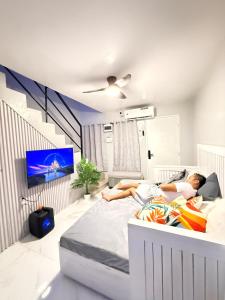 Exclusive 2-bedroom Townhouse with Fast Wi-Fi Netflix Disney Plus Prime Video near Toril Bago Gallera Ulas