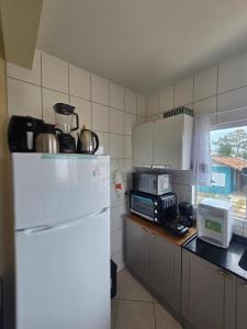 Ótimo apartamento com ampla sacada e vista pro mar
