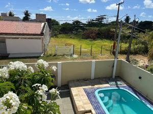 Casa ampla e completa a poucos passos da praia!