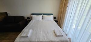 Evdo Apartments F4 White Stay