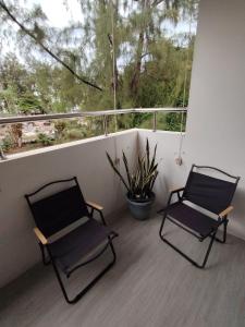 Nayuha Apt A1 - 3 bed rooms - Reach for the beach, across the road