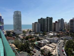 Aconchego no Canto do Forte - Ar Condicionados - Tvs Grandes - Wi-fi e Estacionamento Incluso!