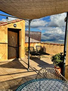 Casa Maroto - Boutique Stay in het hart van Comares, Rooftop terras, uitzicht op zee en bergen, gratis wifi