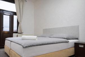 Symbiola Automat Apartments