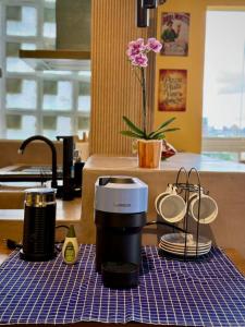 ACORDE Frente ao Mar com VISTA deslumbrante da Orla de Santos