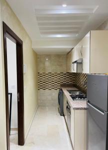 Appartements à 1 min de la gare TGV-fibre-climatiseur-parking-1min de la corniche et Mall city center