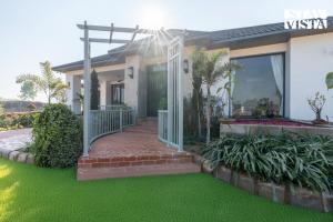 StayVista at Treeansh with Pool, Lawn
