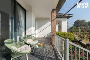 StayVista at Treeansh with Pool, Lawn