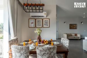 StayVista at Treeansh with Pool, Lawn