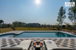 StayVista at Treeansh with Pool, Lawn