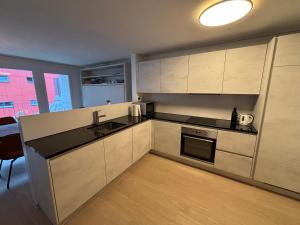 Feel Home Apartments - Seesicht - Terrasse - Parkplatz