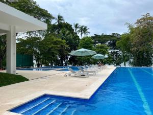 Modern Beach Apartment - Walk to Playa Mantas & Beach Club Access