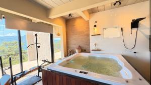 Studio com Spa e vista para o mar em Ilhabela