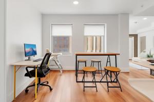 Downtown Tulsa 2BR Escape with Gym Rooftop Lounge & Pet-Friendly Stay