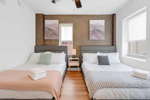 Downtown Tulsa 2BR Escape with Gym Rooftop Lounge & Pet-Friendly Stay