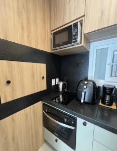 Blue Home Capão - Apto climatizado com Wi-Fi, terraço e piscina