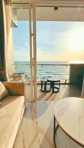 Stylish Beachfront Condo of Ocean and City