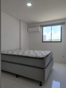 Ap 1 Quarto e sala com varanda a 100m da praia