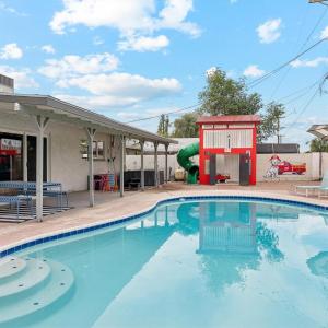 Family Escape with Pool and Fire-Station Playhouse