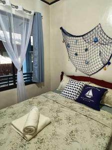 Cozy Studio Near the Beach with Free Parking by Bantayan Paw and Palm Stays
