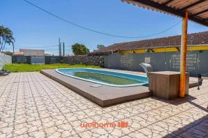 Casa com Piscina e Churrasqueira em Itanhaem