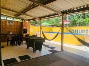 Casa em Ubatuba com piscina há 15 minutos das praias