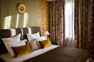 Hotels Grand Hotel du Lion d'Or : photos des chambres