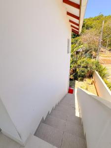 Casa com Vista Parcial do Mar a 500m da Praia, Ponta das Canas, Florianopolis