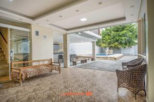 Casa em Bertioga com Piscina e Churrasqueira