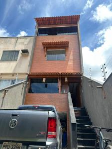 50 metros da praia,Ar condicionado na sala de estar e suíte, Área Gourmet