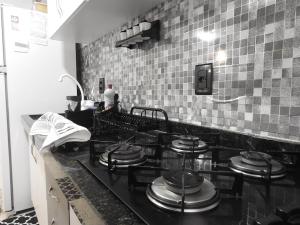 Quarto em apartamento compartilhado 80m da praia em BC