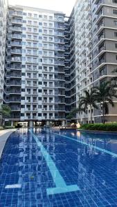 Cozy staycation 1BR with WiFi, Netflix and more at Shore 3 MOA