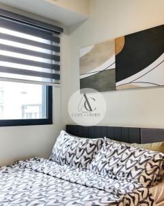 Cozy staycation 1BR with WiFi, Netflix and more at Shore 3 MOA