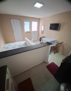 Suíte Beira Mar com Wi-Fi Ideal para Casal mobiliada