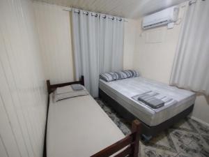 Chalé com garagem fechada