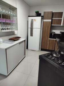 Apartamento pertinho do mar, e roda gigante