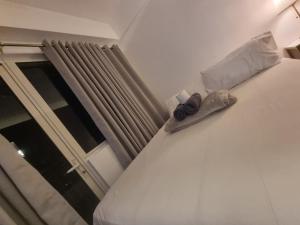 Cozy Bedroom at SM MOA Sunset View by Manila Bay