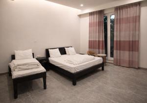 The Peace & The Lagoon 5 Room Boutique Stay with 2 Private Pool and 3 Private Garden