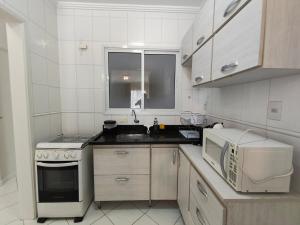 Apartamento pé na areia com vista para o mar