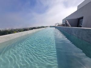 EG12 Playa Grande Aloha Host