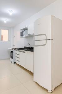 Conforto em família pertinho da praia!