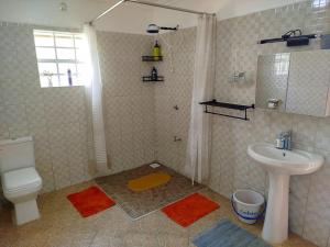 Urban Garden Hideaway Serene one-bedroom retreat with a private garden & chill veranda, 30 Minutes from JKIA