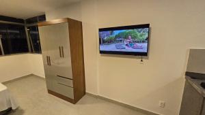 Studio moderno e reformado no Centro